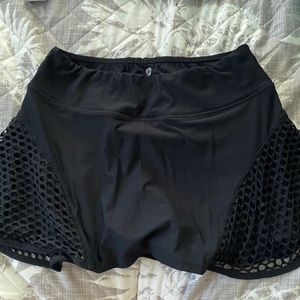 Women’s black skort (shorts underneath) size medium